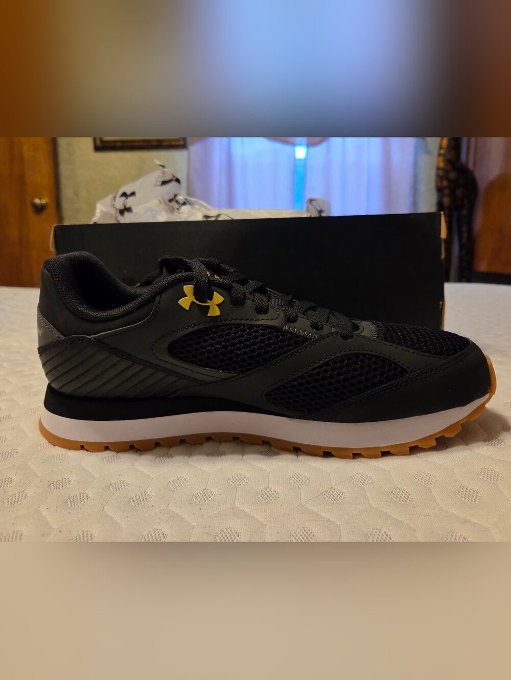 Under Armour Black Athletic Shoes with Gold Logo